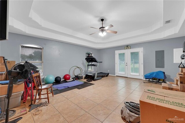 1617 N Monmack Rd, Edinburg, TX 78541 - exercise area with a tray ceiling, electric panel, french doors, ceiling fan, and tile patterned flooring
