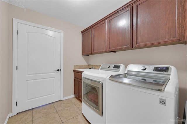 1617 N Monmack Rd, Edinburg, TX 78541 - laundry area with separate washer and dryer, cabinet space, and light tile patterned floors