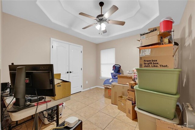 1617 N Monmack Rd, Edinburg, TX 78541 - office space featuring a tray ceiling, ceiling fan, and light tile patterned floors