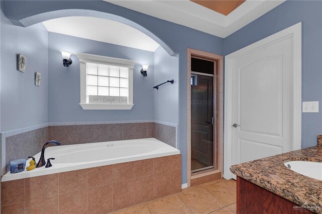 1617 N Monmack Rd, Edinburg, TX 78541 - full bath with vanity, a garden tub, a stall shower, and tile patterned flooring