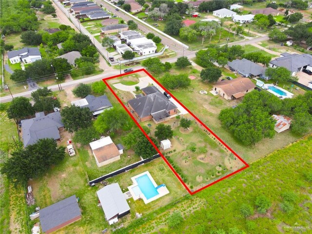 1617 N Monmack Rd, Edinburg, TX 78541 - aerial view of residential area featuring a pool area and property boundaries highlighted