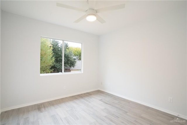 empty room featuring light hardwood / wood-style floors and ceiling fan