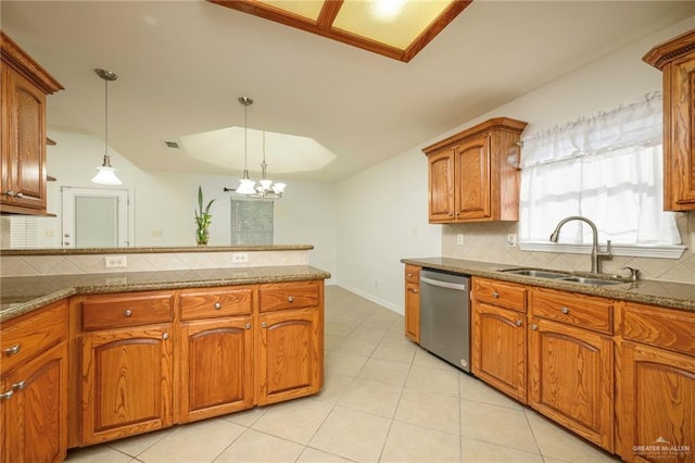 1710 Christian Cir, Harlingen, TX 78550 - kitchen featuring a sink, dishwasher, decorative backsplash, brown cabinetry, and pendant lighting