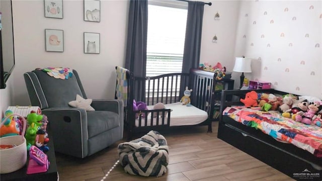 bedroom featuring hardwood / wood-style flooring