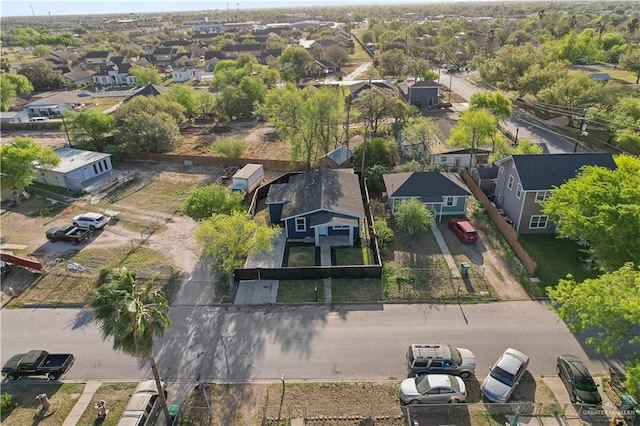 birds eye view of property with a residential view