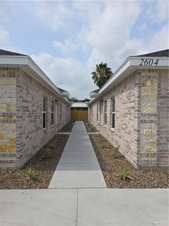 2604 Israel Ave, Alton, TX 78573 - view of home's exterior featuring brick siding