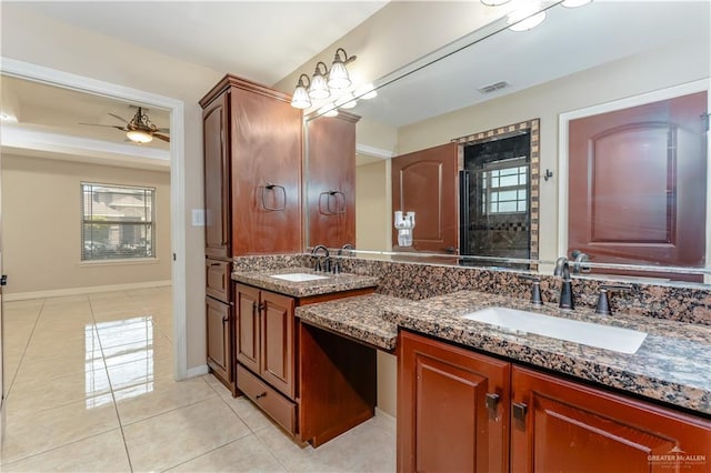 bathroom featuring vanity, plenty of natural light, tile patterned floors, and ceiling fan