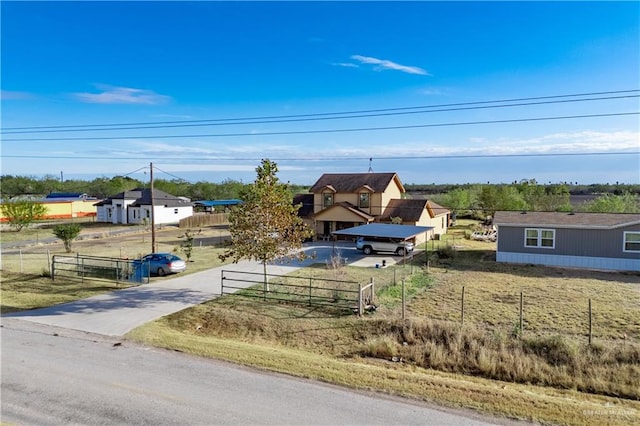 view of front of property featuring fence