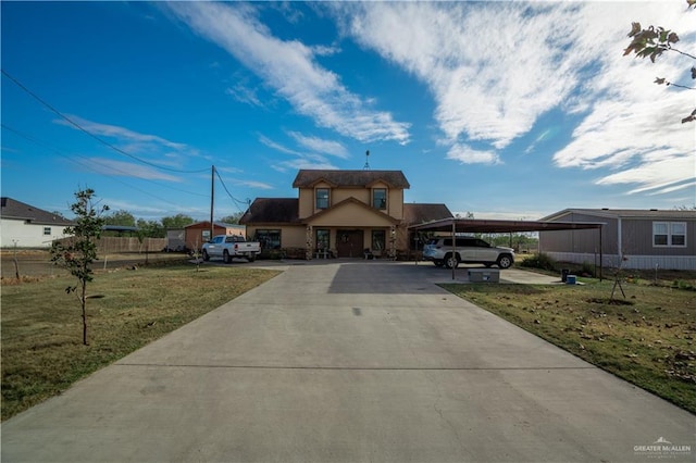 view of front of home with a front lawn