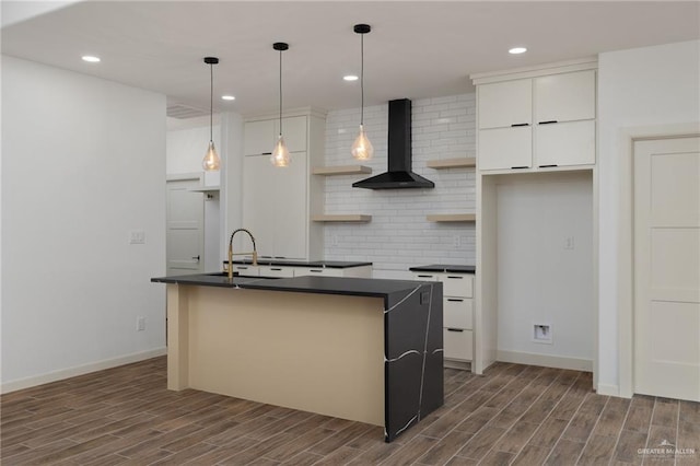9218 N 25th Ln, Mcallen, TX 78504 - kitchen with wall chimney exhaust hood, a sink, open shelves, dark countertops, and dark wood finished floors