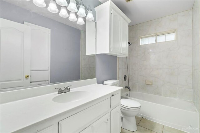 1411 Dons Dr, Mission, TX 78572 - full bath featuring toilet, vanity, tile patterned flooring, and  shower combination