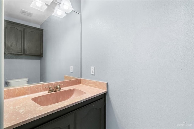 1411 Dons Dr, Mission, TX 78572 - bathroom with vanity and toilet
