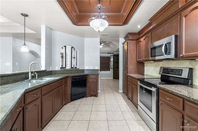 1411 Dons Dr, Mission, TX 78572 - kitchen with appliances with stainless steel finishes, a raised ceiling, a sink, light tile patterned floors, and backsplash