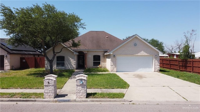 2700 Duke Ave, Mcallen, TX 78504 - view of front of property with an attached garage and concrete driveway