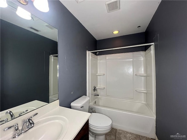 2700 Duke Ave, Mcallen, TX 78504 - bathroom featuring toilet, tile patterned floors, vanity, and shower / bathtub combination