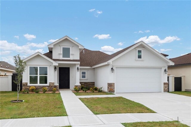1809 Diplomat Dr, Edinburg, TX 78542 - modern farmhouse style home with stone siding, a shingled roof, stucco siding, and a front yard