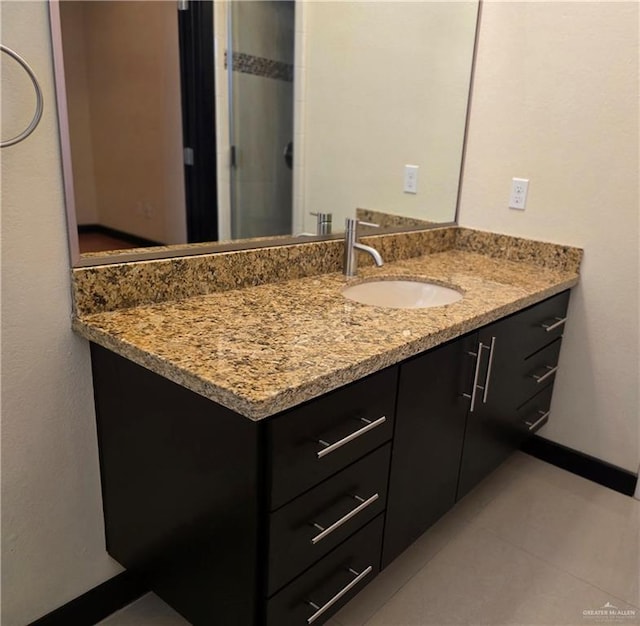 bathroom featuring vanity and tile patterned floors