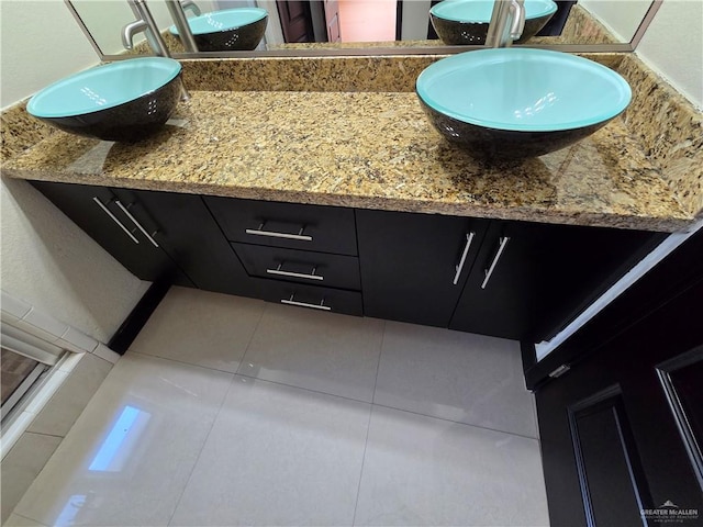 bathroom featuring vanity and tile patterned floors