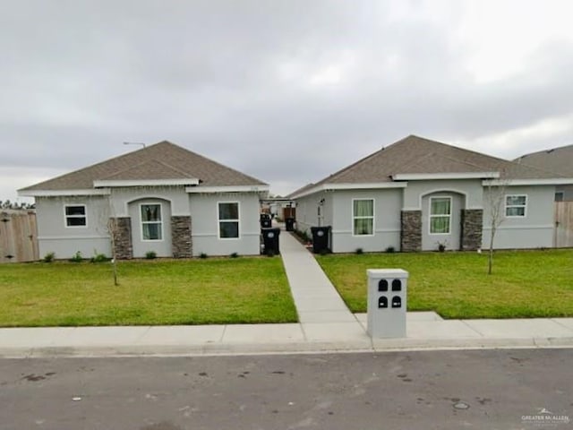 2108 Davenport St, Weslaco, TX 78596 - view of front facade with stucco siding and stone siding