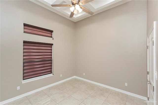 empty room featuring ceiling fan and light tile patterned floors