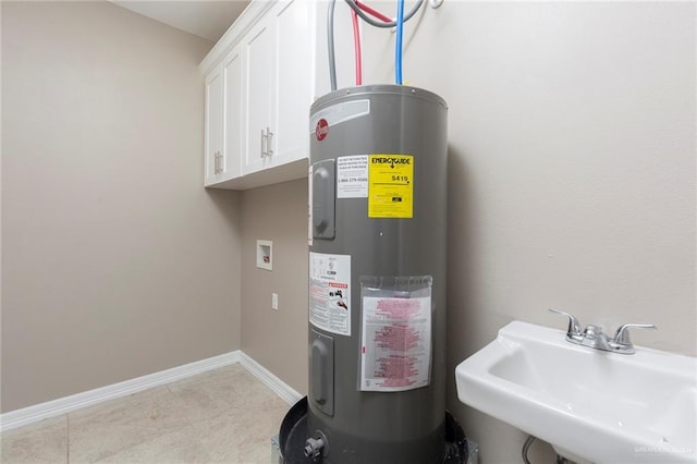 utilities featuring electric water heater and sink