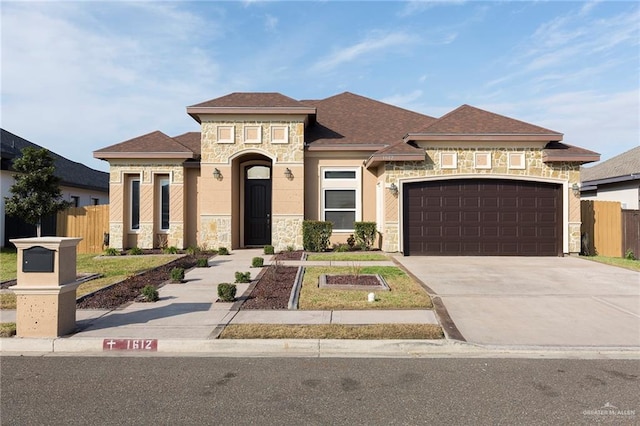 view of front of home with a garage