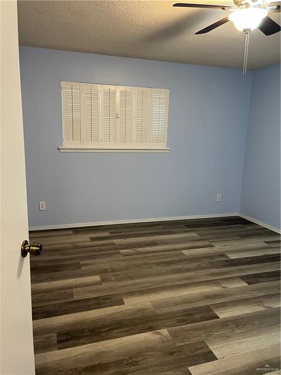 1601 S Oklahoma Ave, Weslaco, TX 78596 - spare room featuring ceiling fan, dark wood-style floors, and a textured ceiling