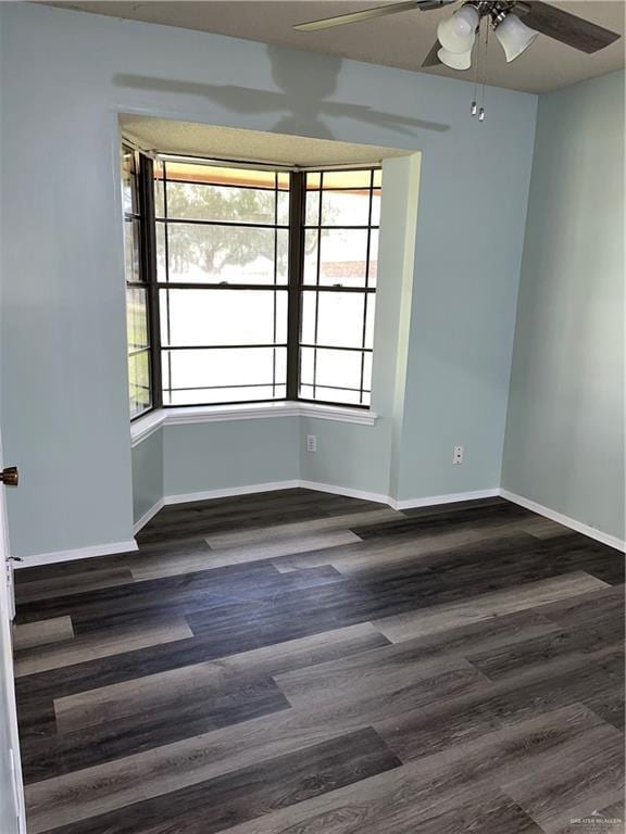 1601 S Oklahoma Ave, Weslaco, TX 78596 - empty room with ceiling fan and wood finished floors