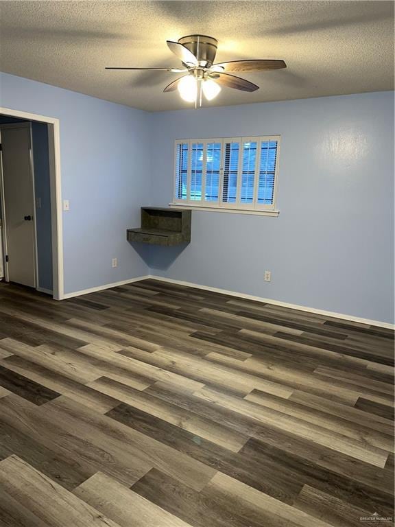 1601 S Oklahoma Ave, Weslaco, TX 78596 - unfurnished room featuring a ceiling fan, wood finished floors, and a textured ceiling