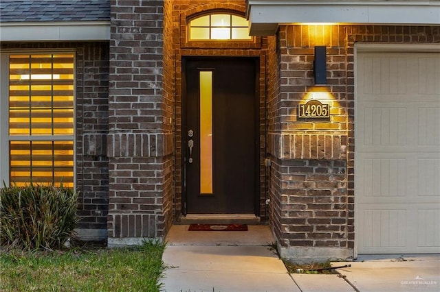 property entrance featuring a garage