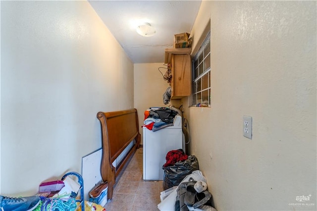 storage room featuring washer and clothes dryer