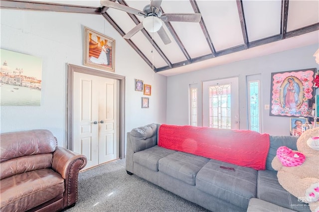 living room with vaulted ceiling with beams, carpet floors, and ceiling fan