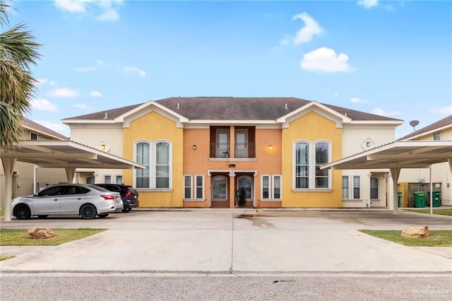 view of front of home featuring a carport