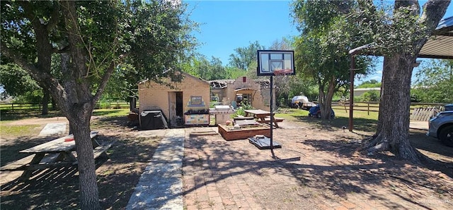 3220 N Taylor Rd, Mcallen, TX 78501 - view of patio / terrace featuring fence and a vegetable garden