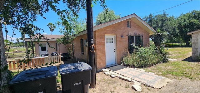 3220 N Taylor Rd, Mcallen, TX 78501 - bungalow-style home with brick siding and fence