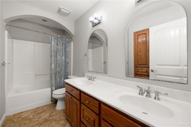 full bathroom with tile patterned floors, vanity, toilet, and shower / bathtub combination with curtain