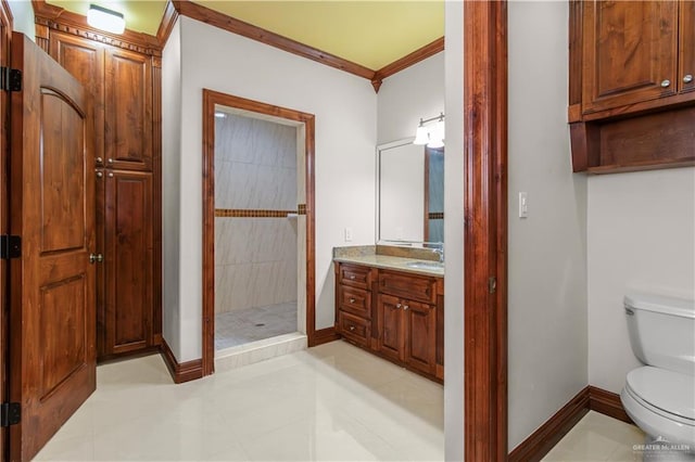 bathroom with vanity, a shower, tile patterned flooring, toilet, and ornamental molding