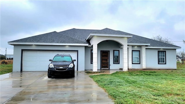 single story home featuring roof with shingles, stucco siding, concrete driveway, a garage, and a front lawn