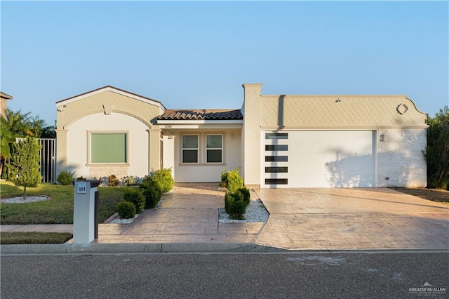 view of front of property with a garage