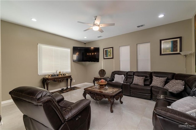 living room featuring ceiling fan