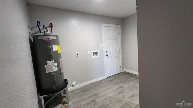 utility room featuring water heater