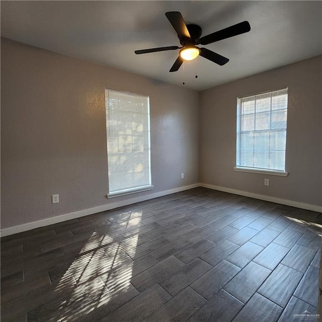 spare room with ceiling fan