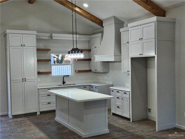kitchen with custom range hood, open shelves, wood finish floors, a sink, and recessed lighting