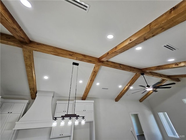 kitchen view of beam ceiling, white cabinets, recessed lighting, ceiling fan, and decorative light fixtures