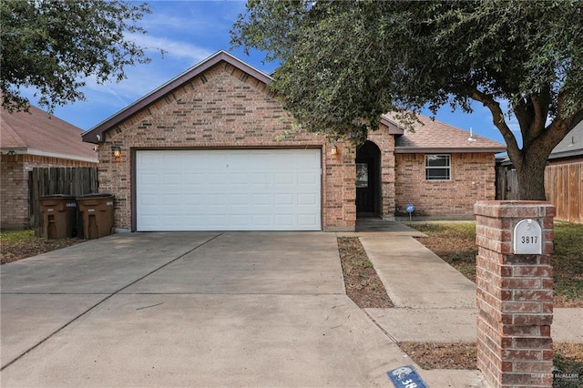 3817 Frontier Dr, Edinburg, TX 78539 - single story home featuring brick siding, driveway, and an attached garage