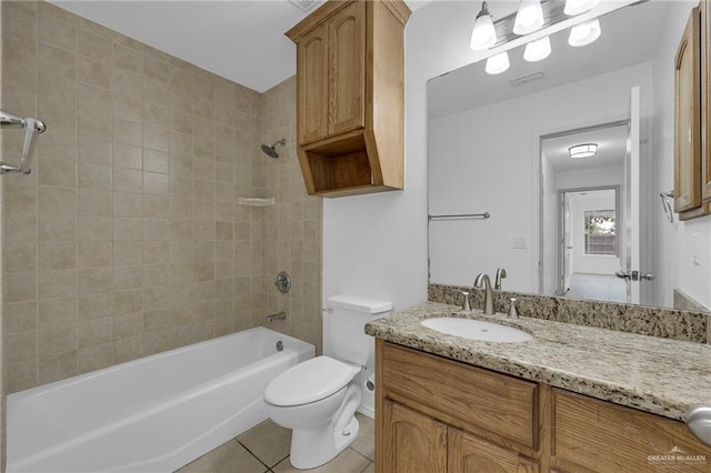 3817 Frontier Dr, Edinburg, TX 78539 - full bathroom with tile patterned flooring, vanity, toilet, and shower / washtub combination