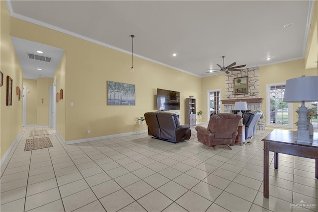 living room with a fireplace, light tile patterned floors, ceiling fan, and crown molding