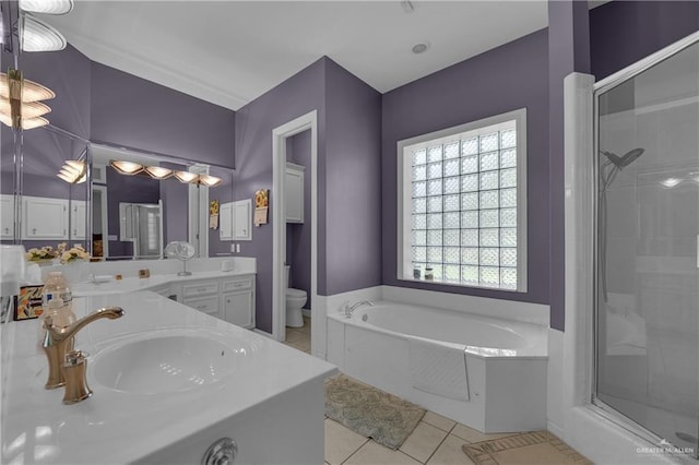 full bathroom featuring tile patterned floors, vanity, toilet, and plus walk in shower