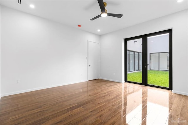 2228 S 45th St, Mcallen, TX 78503 - unfurnished room featuring wood finished floors, recessed lighting, baseboards, and a ceiling fan