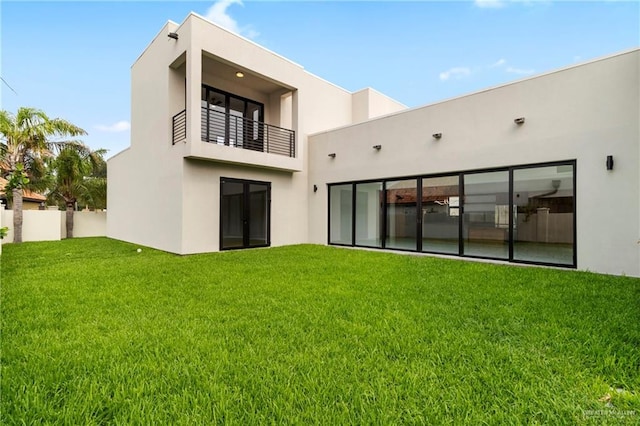 2228 S 45th St, Mcallen, TX 78503 - back of house featuring stucco siding and a balcony